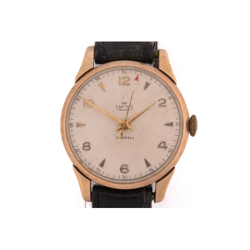 294 - A Smiths De Luxe 9ct gold wrist watch, with a 'Made in London' 17 jewels hand-wound movement in a 9c... 