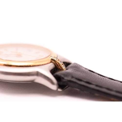 297 - A lady's Bertolucci diamond set watch, with a swiss-made 7 jewelled quartz movement in a steel case ... 