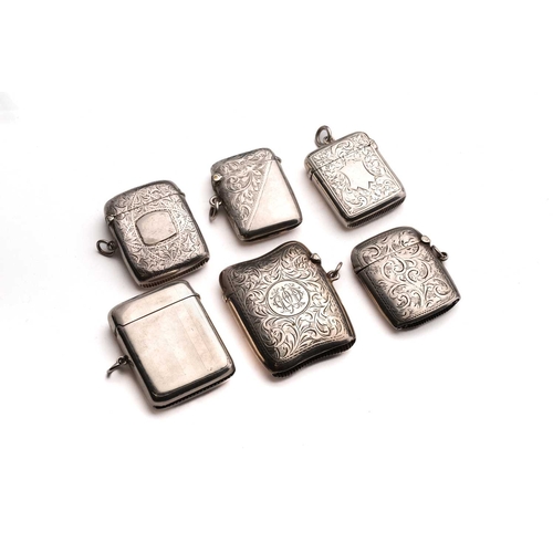 421 - A Victorian silver vesta case; rounded rectangular, foliate engraved, with side hinged opening and s... 