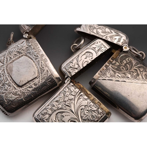421 - A Victorian silver vesta case; rounded rectangular, foliate engraved, with side hinged opening and s... 