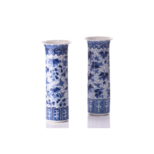 100 - A pair of Chinese blue and white porcelain bottle vases, Qing Dynasty, late 19th century, painted wi... 