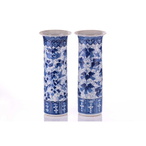 100 - A pair of Chinese blue and white porcelain bottle vases, Qing Dynasty, late 19th century, painted wi... 