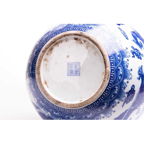 102 - A pair of large Chinese blue and white porcelain bottle vases, 20/21st century. Each is decorated wi... 