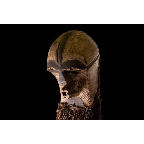 106 - A Songye kifwebe mask, Kikashi, Eastern Songye, Democratic Republic of Congo, with linear carved dec... 