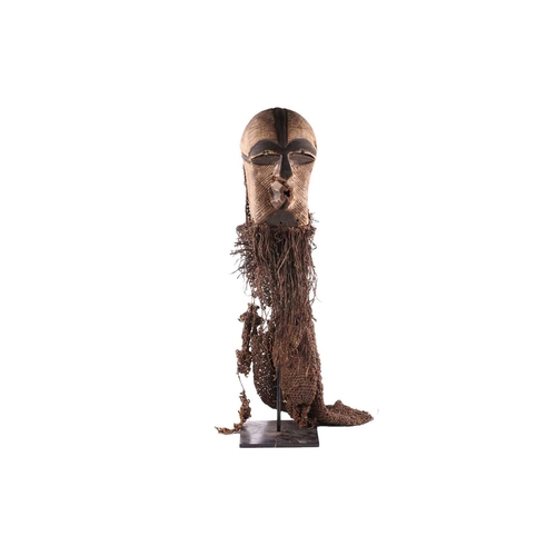 106 - A Songye kifwebe mask, Kikashi, Eastern Songye, Democratic Republic of Congo, with linear carved dec... 