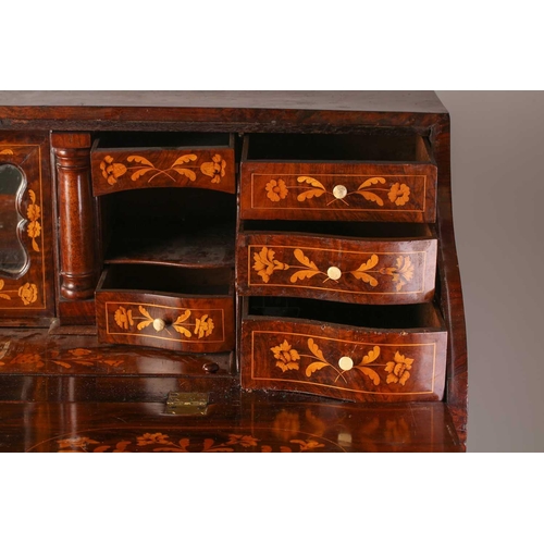 112 - A late 18th century/early 19th-century Dutch marquetry inlaid walnut double bombe fronted writing bu... 