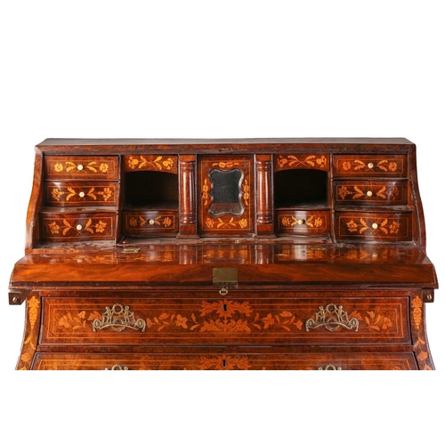 112 - A late 18th century/early 19th-century Dutch marquetry inlaid walnut double bombe fronted writing bu... 