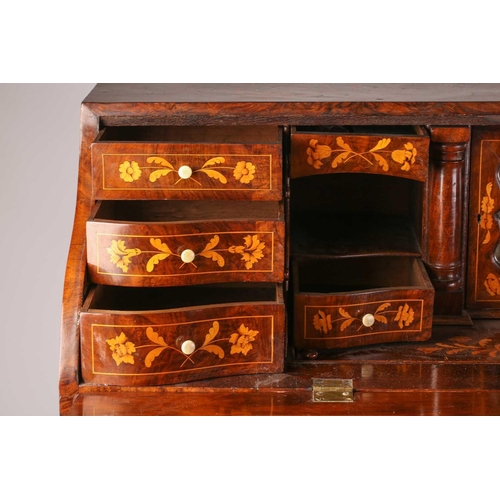 112 - A late 18th century/early 19th-century Dutch marquetry inlaid walnut double bombe fronted writing bu... 