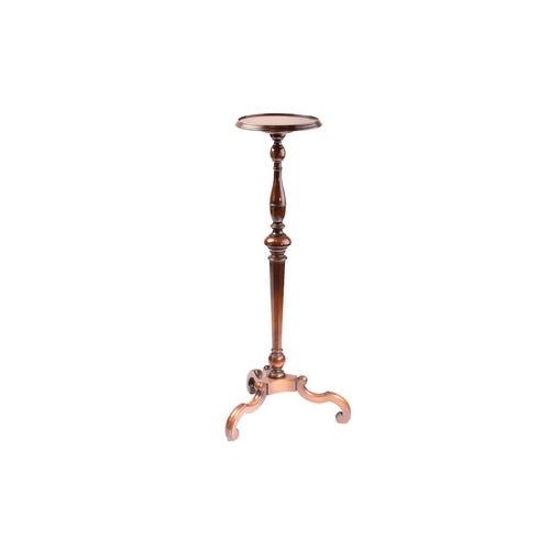 115 - A Queen Anne style walnut torchere stand with dish top inverted trumpet column and Vitruvian scroll ... 