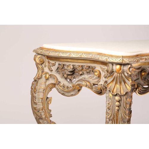 116 - An 18th-century style Venetian carved, painted and parcel gilt serpentine console table, 20th centur... 