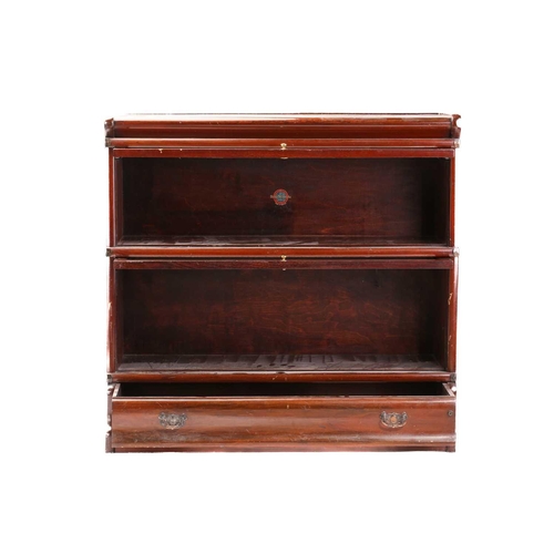 122 - A pair of two-section mahogany Globe Wernicke modular bookcases with bevelled edge plain glazing and... 