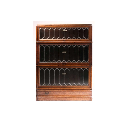 123 - A pair of Globe Wernicke four-section modular stacking oak bookcases each bookcase with leaded glazi... 