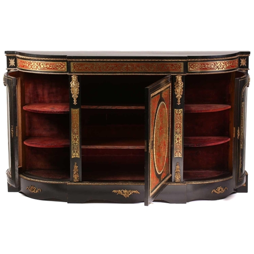 141 - A Victorian ebonized and red tortoiseshell Boulle worked credenza. With a central cupboard door with... 