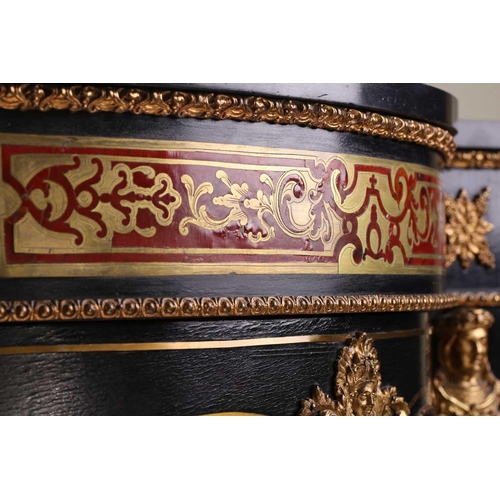 141 - A Victorian ebonized and red tortoiseshell Boulle worked credenza. With a central cupboard door with... 