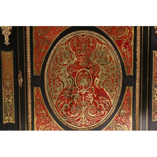 141 - A Victorian ebonized and red tortoiseshell Boulle worked credenza. With a central cupboard door with... 