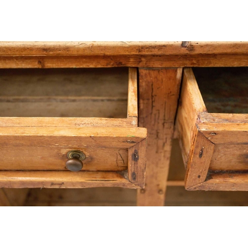 146 - An architectural stripped pine dresser and integral rack, 19th century and later adaptations. With t... 