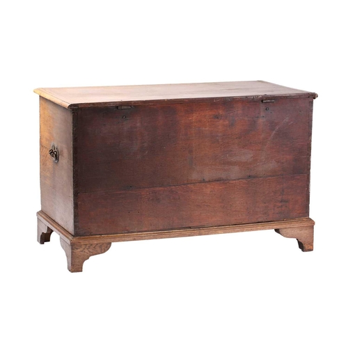 151 - A late 18th-century mule chest with a hinged cover opening to reveal a drawer-fitted interior with a... 