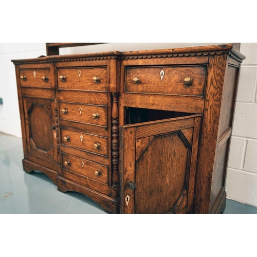 159 - A 19th-century Welsh (probably Anglesey) oak and deal breakfront base dresser and rack, with three f... 