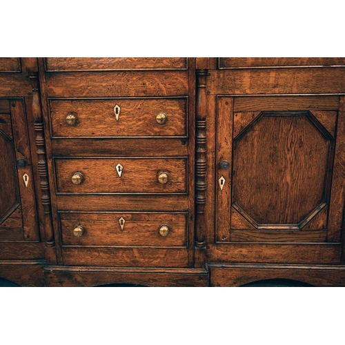 159 - A 19th-century Welsh (probably Anglesey) oak and deal breakfront base dresser and rack, with three f... 