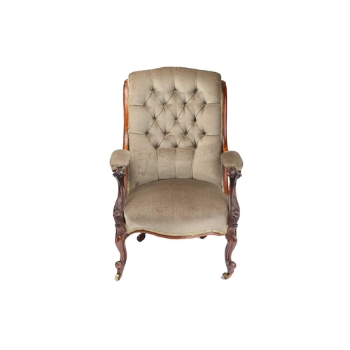 162 - An early Victorian figured rosewood scroll back open armchair on carved cabriole legs with brass swi... 