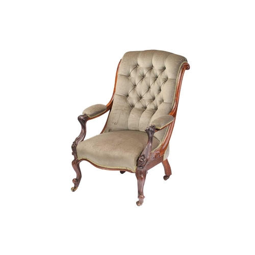 162 - An early Victorian figured rosewood scroll back open armchair on carved cabriole legs with brass swi... 