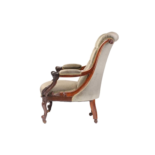 162 - An early Victorian figured rosewood scroll back open armchair on carved cabriole legs with brass swi... 