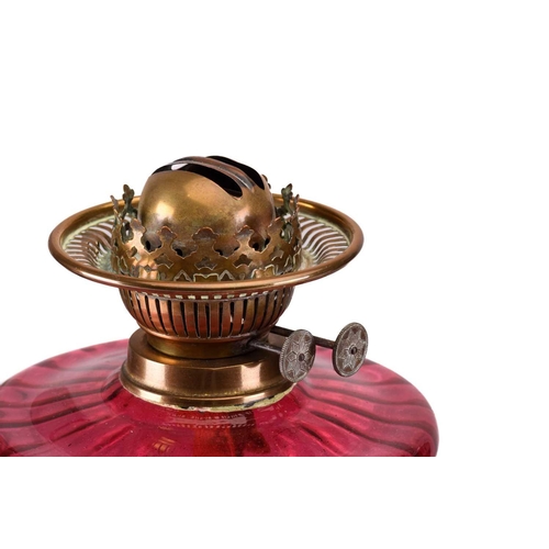 167 - A Victorian pillar duplex oil lamp with cranberry glass reservoir oil lamp with acid frosted diffuse... 