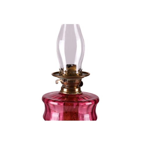 167 - A Victorian pillar duplex oil lamp with cranberry glass reservoir oil lamp with acid frosted diffuse... 