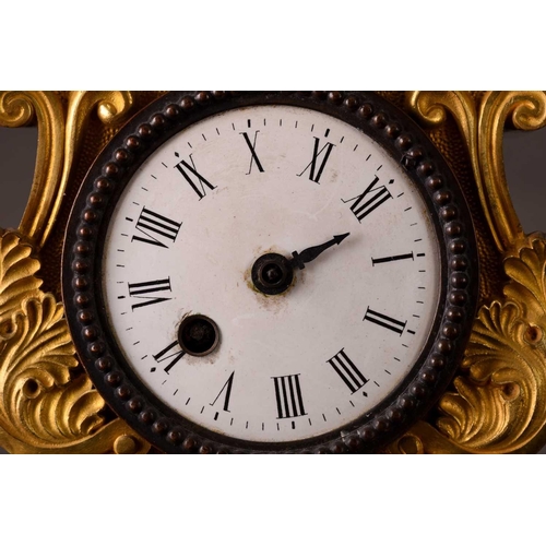 171 - A small french Napoleon III patinated bronze and ormolu mantle clock with a surmount in the form of ... 