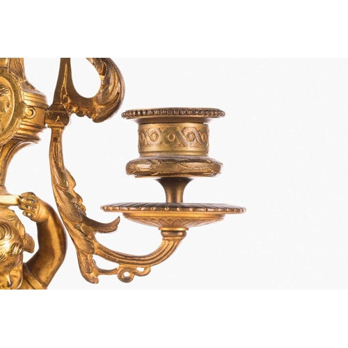 172 - A late 19th century Henry Marc of Paris 8-day ormolu clock garniture with figural surmounts of a pai... 