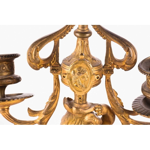 172 - A late 19th century Henry Marc of Paris 8-day ormolu clock garniture with figural surmounts of a pai... 