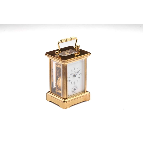 174 - A Matthew Norman miniature brass four-glass carriage clock, in fitted case with original paperwork.