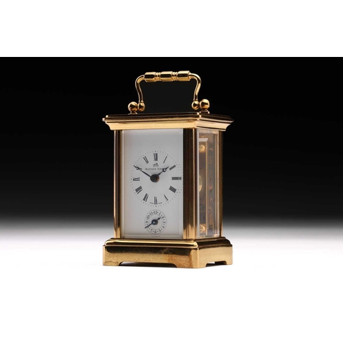 174 - A Matthew Norman miniature brass four-glass carriage clock, in fitted case with original paperwork.