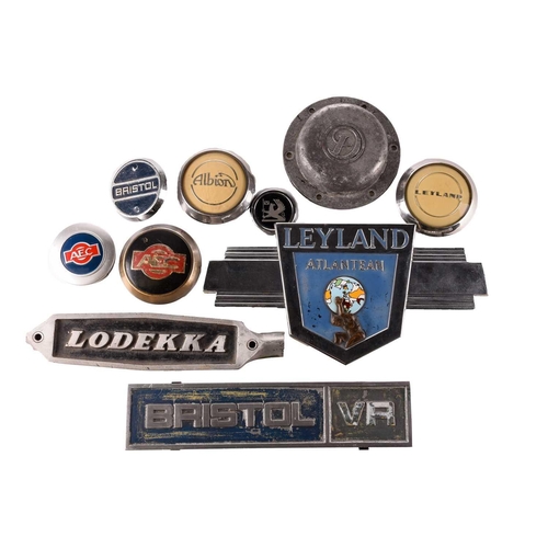 187 - A Leyland Atlantean chrome and enamel bus badge, 38 cm wide, together with a Lodekka badge, a Bristo... 