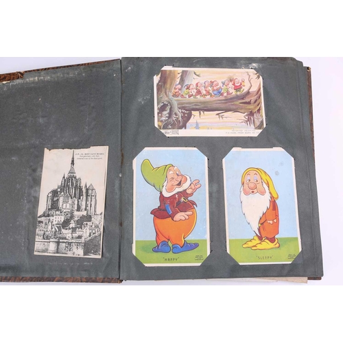 197 - A vintage postcard album containing many colour and sepia postcards including Mabel Lucy Attwell, Ma... 