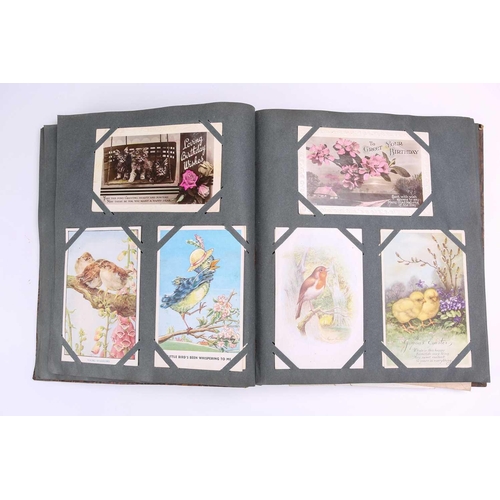 197 - A vintage postcard album containing many colour and sepia postcards including Mabel Lucy Attwell, Ma... 