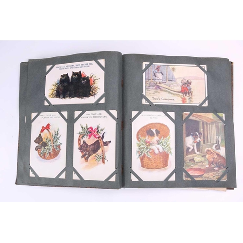 197 - A vintage postcard album containing many colour and sepia postcards including Mabel Lucy Attwell, Ma... 