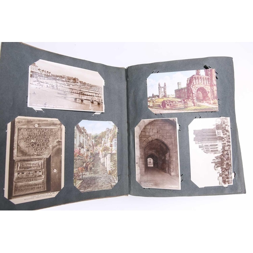 197 - A vintage postcard album containing many colour and sepia postcards including Mabel Lucy Attwell, Ma... 