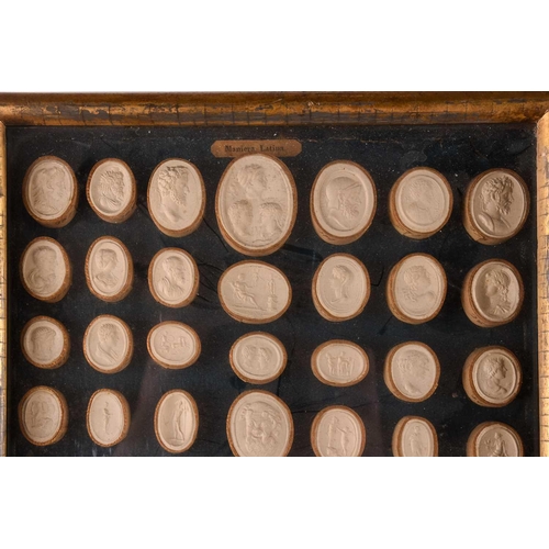 198 - Two gilt box framed arrangements of grand tour plaster intaglios one frame bearing the legend, 'Stil... 