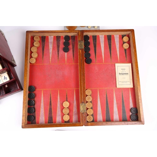 199 - A Chinese early 20th century cased bamboo and bone Mahjong set with tile trays marked for the geogra... 