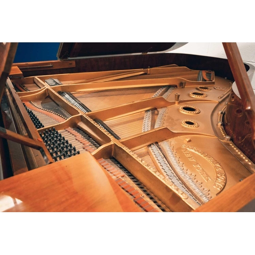 210 - A Steinway of New York baby grand piano No 212527 (1922) with rosewood case. The cast iron inner fra... 