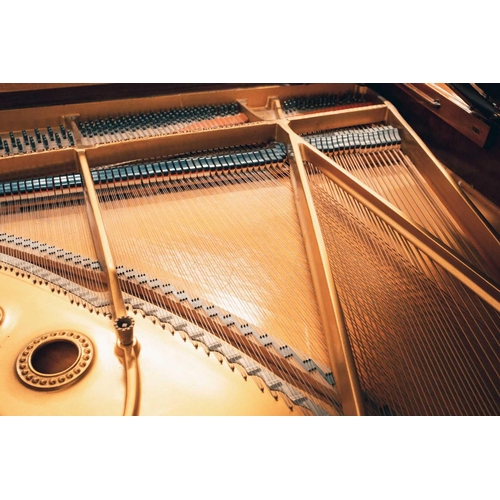 210 - A Steinway of New York baby grand piano No 212527 (1922) with rosewood case. The cast iron inner fra... 