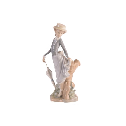 220 - Two Lladro figural table lamp bases, each modelled with a girl holding a basket, 39 cm high, togethe... 