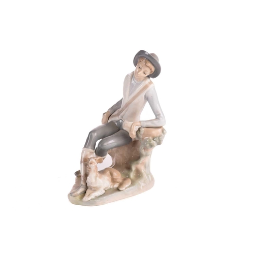 220 - Two Lladro figural table lamp bases, each modelled with a girl holding a basket, 39 cm high, togethe... 