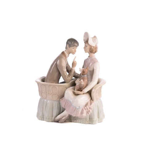 220 - Two Lladro figural table lamp bases, each modelled with a girl holding a basket, 39 cm high, togethe... 