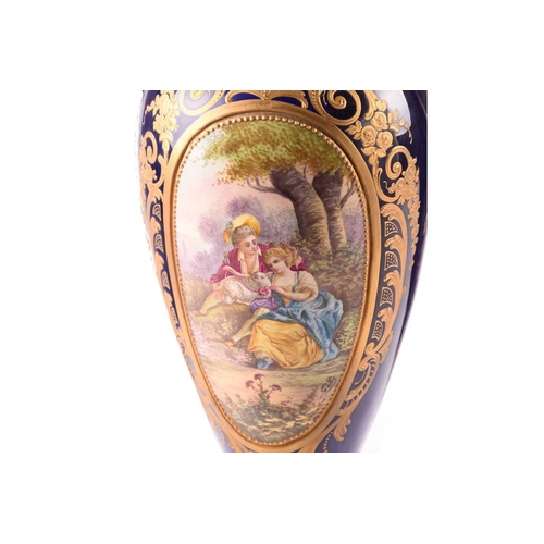 223 - A pair of large Sevres style vases and covers, late 19th or early 20th century, each with a painted ... 