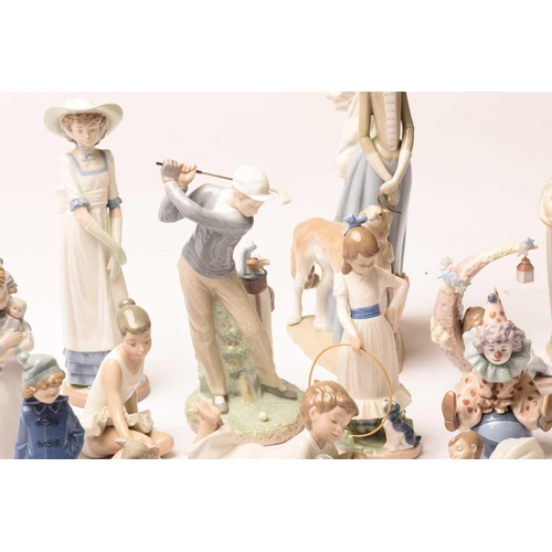 228 - A large collection of Lladro and Nao figurines, the majority boxed.Appear well-looked after and unda... 