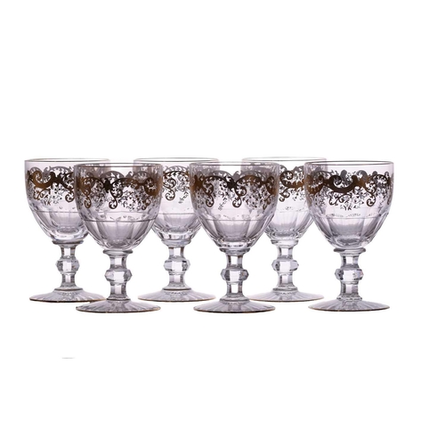 233 - Saint Louis: a set of six small Trianon crystal glass water goblets, together with a conforming set ... 