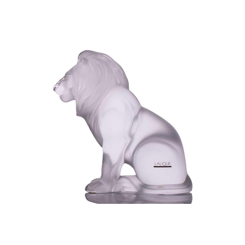 236 - A Lalique 'Bamara' frosted glass sculpture of a lion seat on his haunches. 20 cm high x 17 cm long x... 