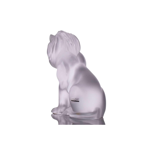 236 - A Lalique 'Bamara' frosted glass sculpture of a lion seat on his haunches. 20 cm high x 17 cm long x... 